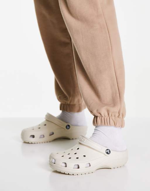 Cream crocs on sale