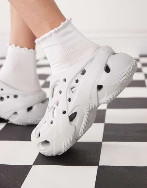 Crocs caged clogs in atmosphere, 2 of 4
