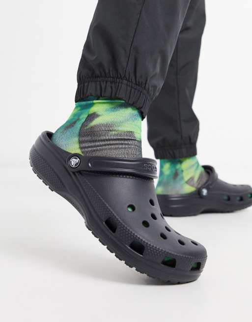 Crocs negros outlet