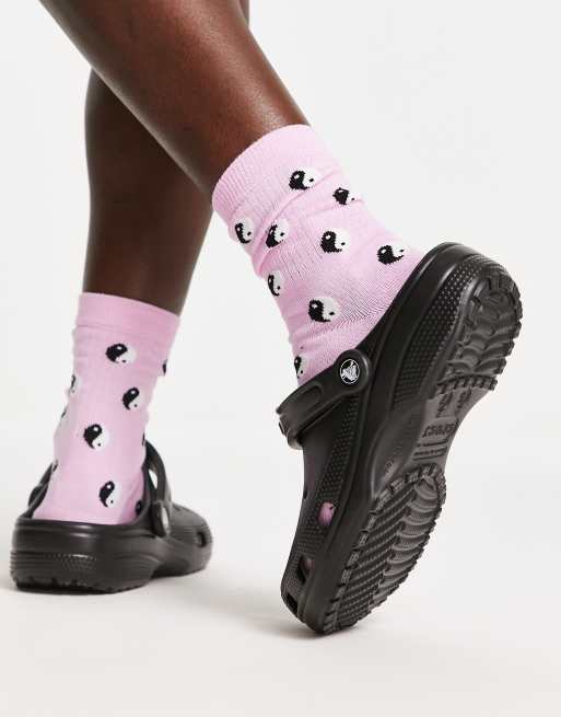 Pink and deals black crocs