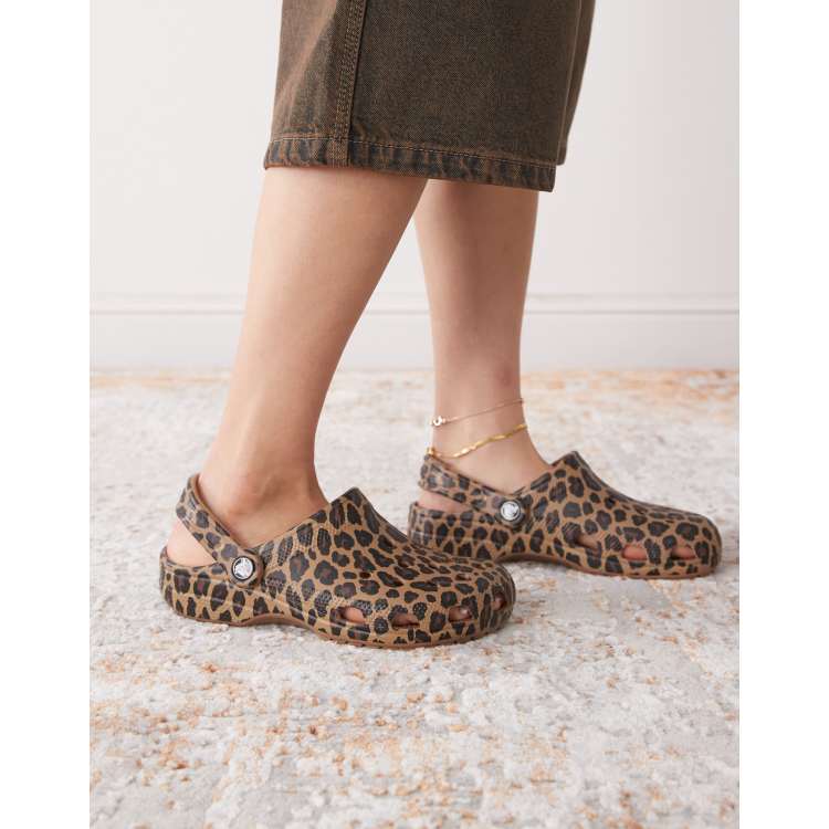 Crocs Classic clogs in brown leopard print | ASOS
