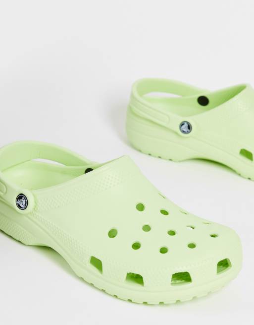 Crocs classic clogs in celery green | ASOS