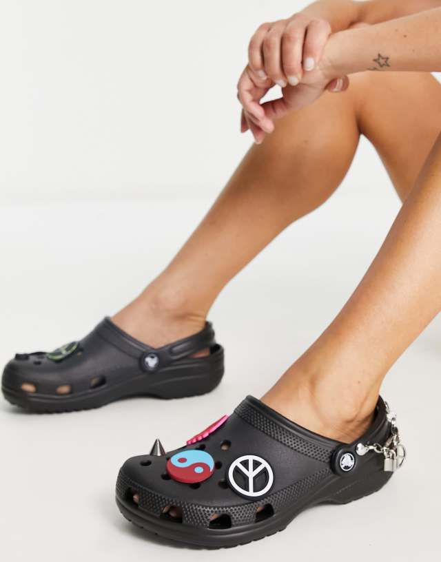 Crocs classic clogs in create your peace in black