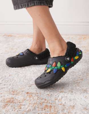 Crocs - Classic - Clogs in Schwarz mit Fleece-Futter und Lichter-Detail, unisex