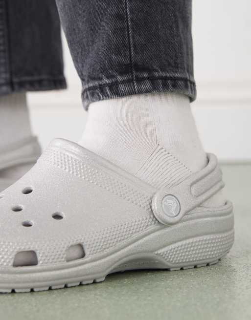Crocs classic clogs in silver glitter ASOS