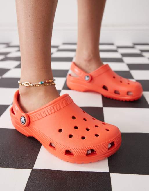 Crocs classic clogs in starfish orange ASOS