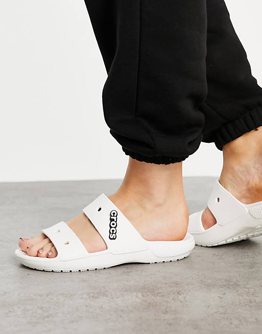 Crocs classic flat sandals in white | ASOS