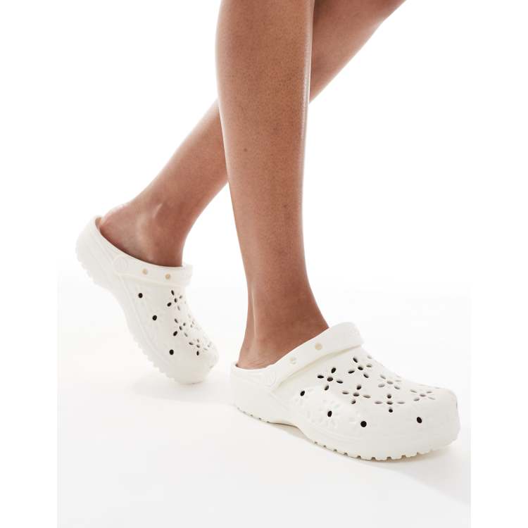 Crocs Classic floral cut-out clogs in chalk | ASOS
