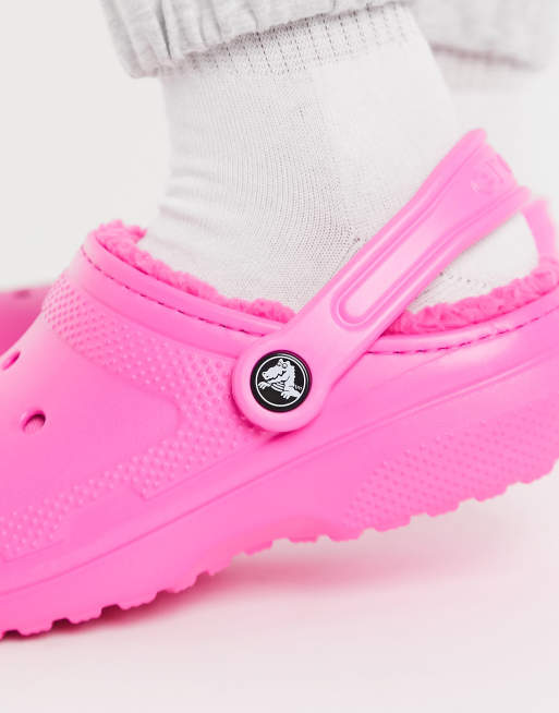 Crocs classic fluffy-lined clogs in pink | ASOS