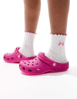 Crocs Classic glitter clogs in pink crush