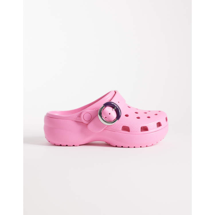 Crocs Classic Platform Buckle Clogs in pink | ASOS