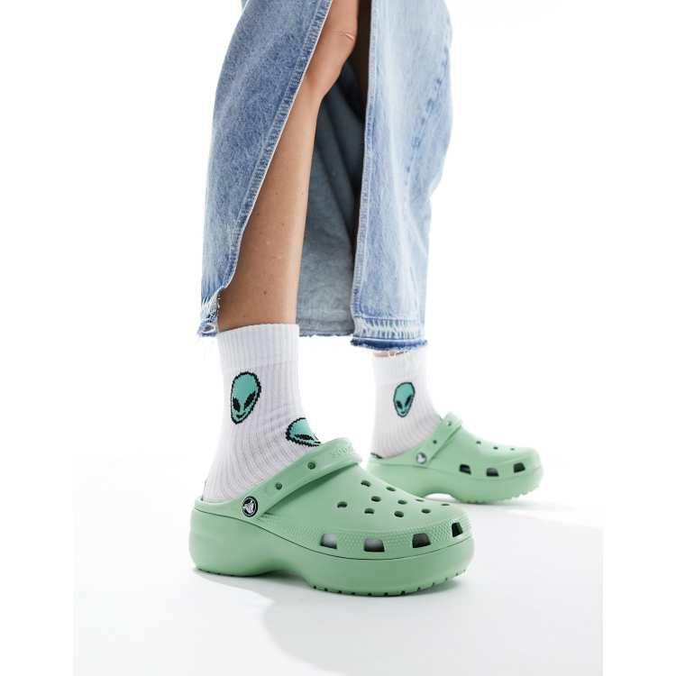 Crocs classic platform clogs in pastel green ASOS