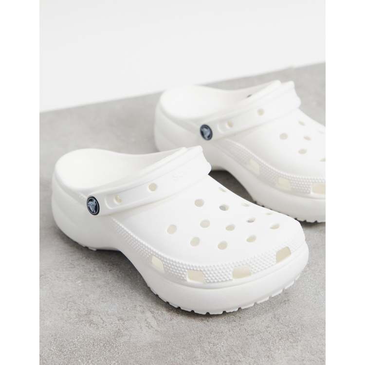 white crocs with three straps