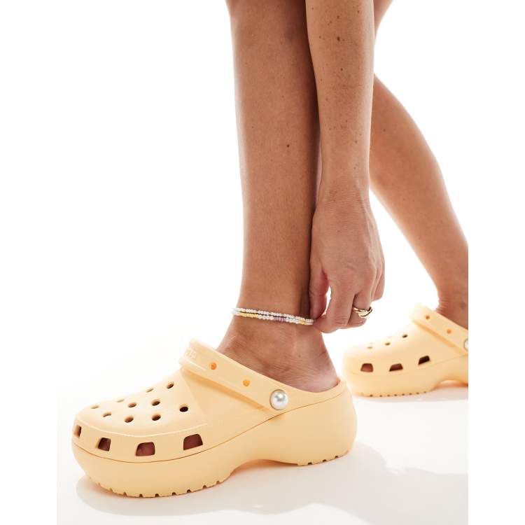Crocs Classic platform pearl clogs in golden hour ASOS