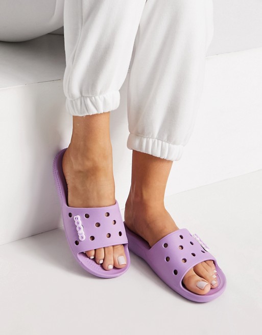 Crocs classic slide flat sandals in lilac