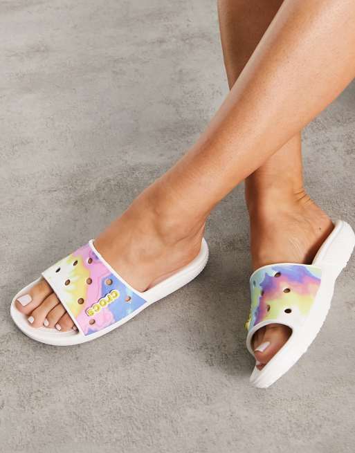 Crocs classic slide flat sandals in tie dye graphic