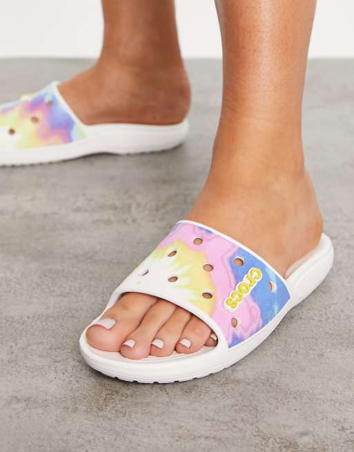 Crocs classic slide flat sandals in tie dye graphic ASOS