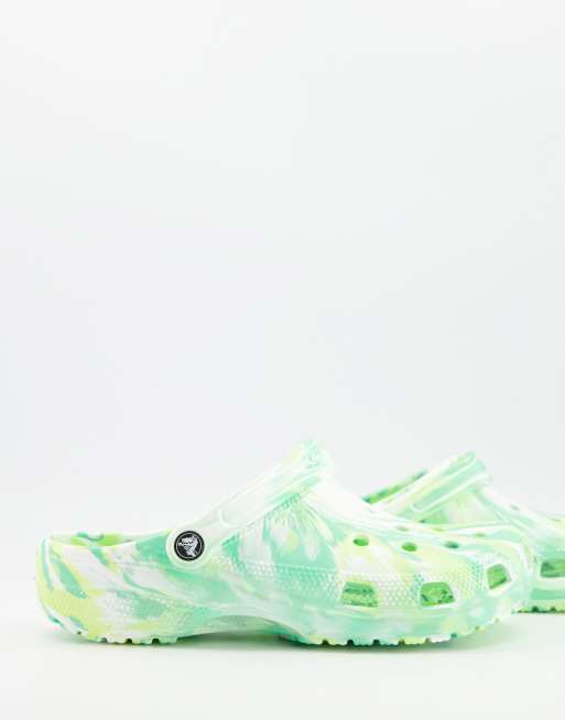 Green and white store crocs