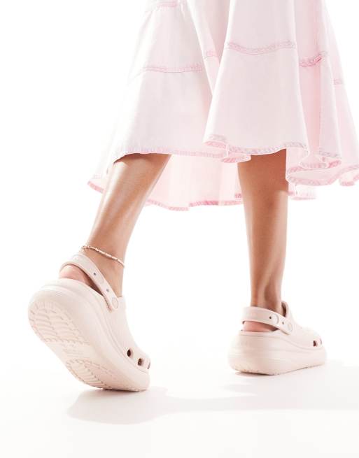 Pink and black crocs on sale