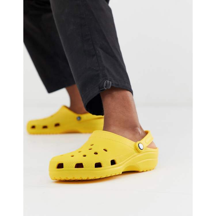 Black and yellow crocs shop