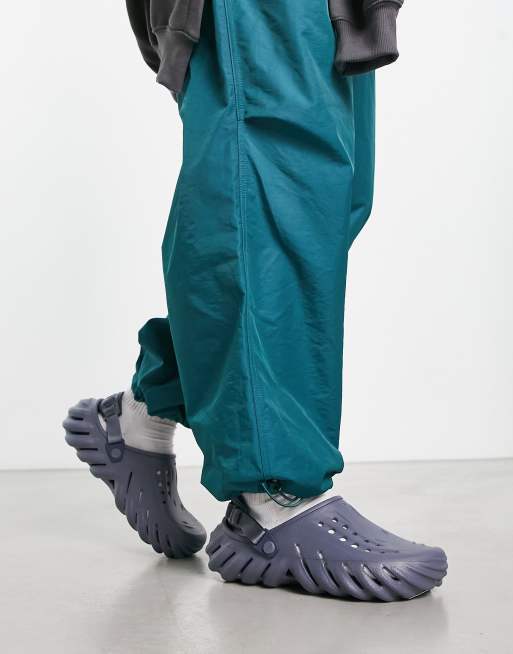 Dark store teal crocs