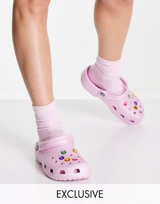 Crocs exclusive classic clogs with removable pastel gems in ballerina pink - ASOS Price Checker