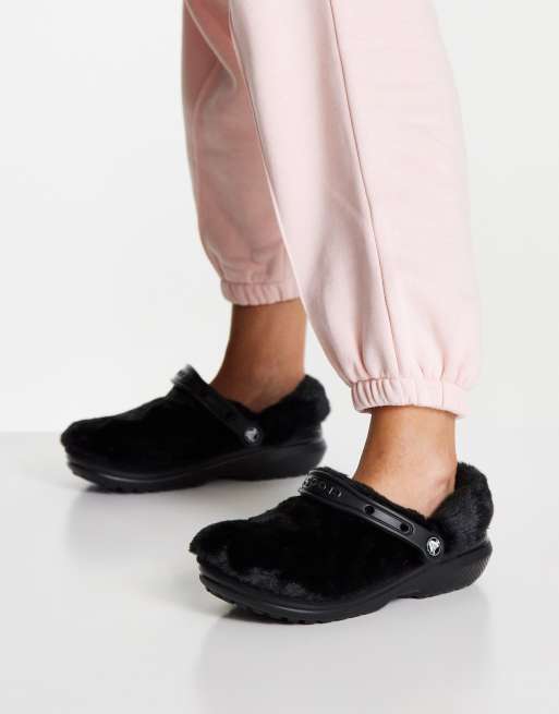 Crocs Fur Sure classic lined clogs in black | ASOS