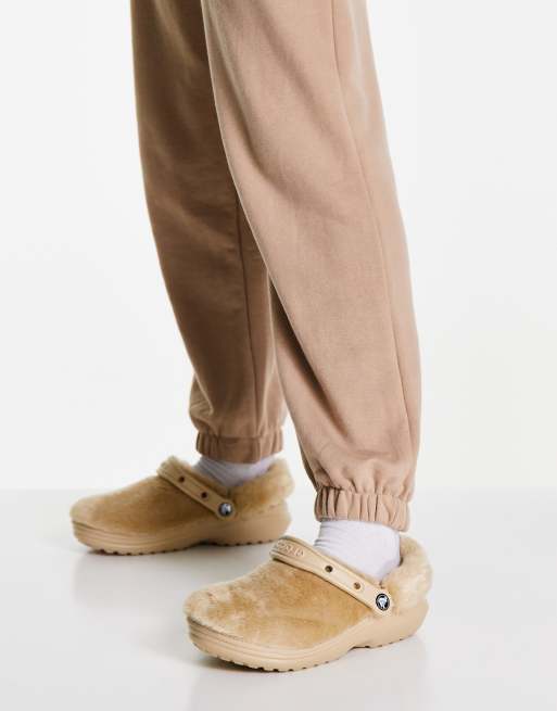 Tan crocs with store fur