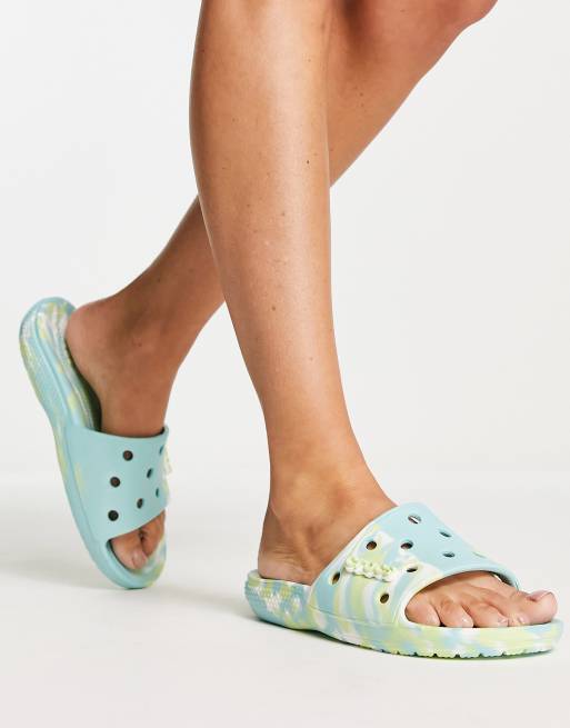 Crocs - Klassiske flade slider-sandaler med sellerigrøn marmorering