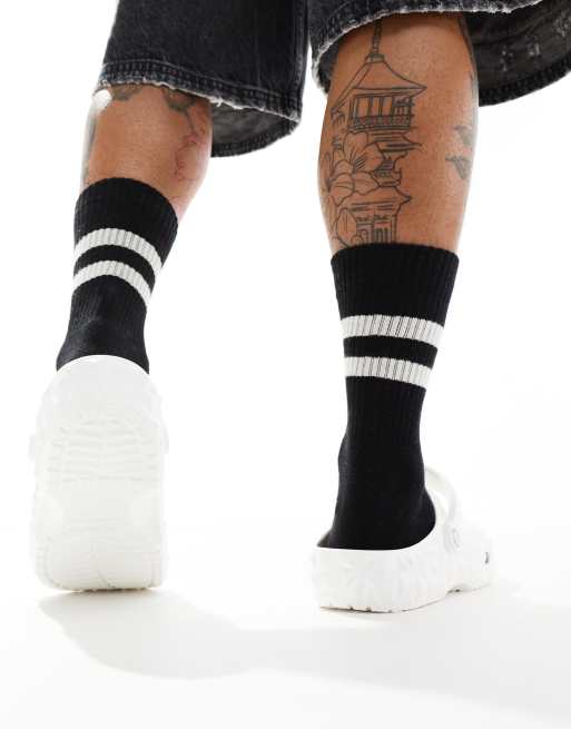 Crocs Unisex Classic clogs in geometric white ASOS