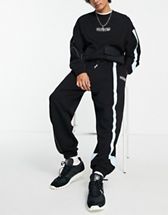 Nike Sport Essentials Multi Futura logo t-shirt in black | ASOS