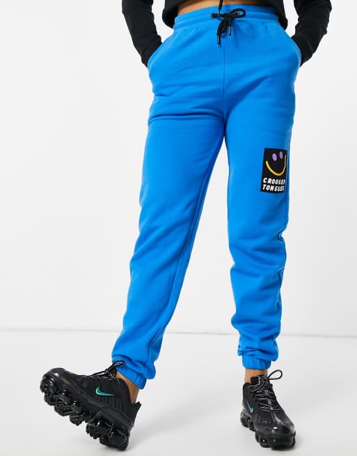 Crooked Tongues co-ord trackies with badge logo in bright blue