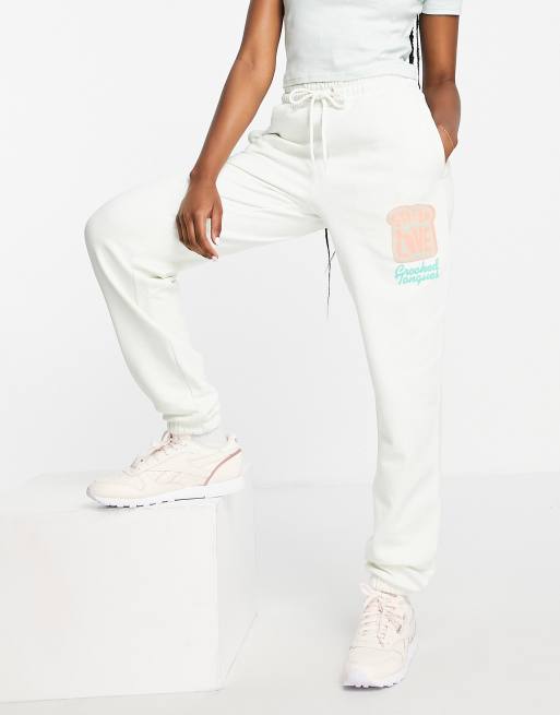 Crooked Tongues co-ord trackies with spread love print in stone