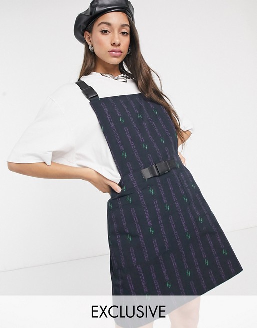Crooked Tongues dungaree dress in print