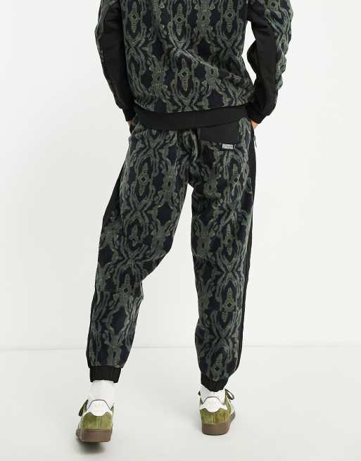 Crooked Tongues fleece camo patch sweatpants in multi - part of a set