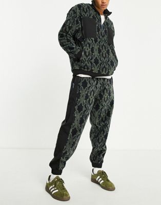 Crooked Tongues fleece co-ord camo patch jogger in multi
