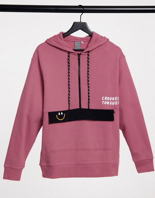 Crooked Tongues hoodie with large pocket in pink