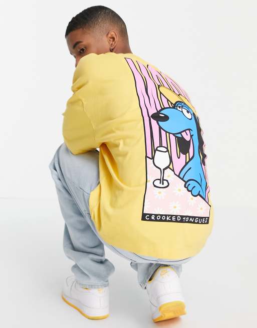 Crooked Tongues - Oversized T-shirt met grafische print van hondenpersonage op de achterkant in oranje