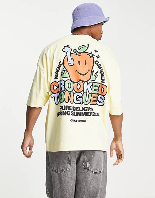 Crooked Tongues oversized t-shirt with apple graphic print in yellow