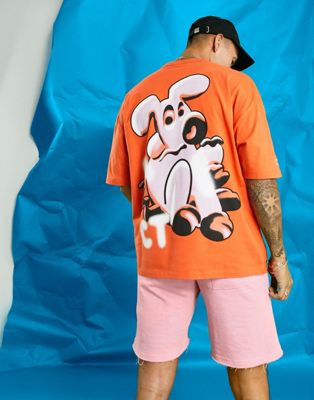 Crooked Tongues oversized t-shirt with spray paint dog back print in orange