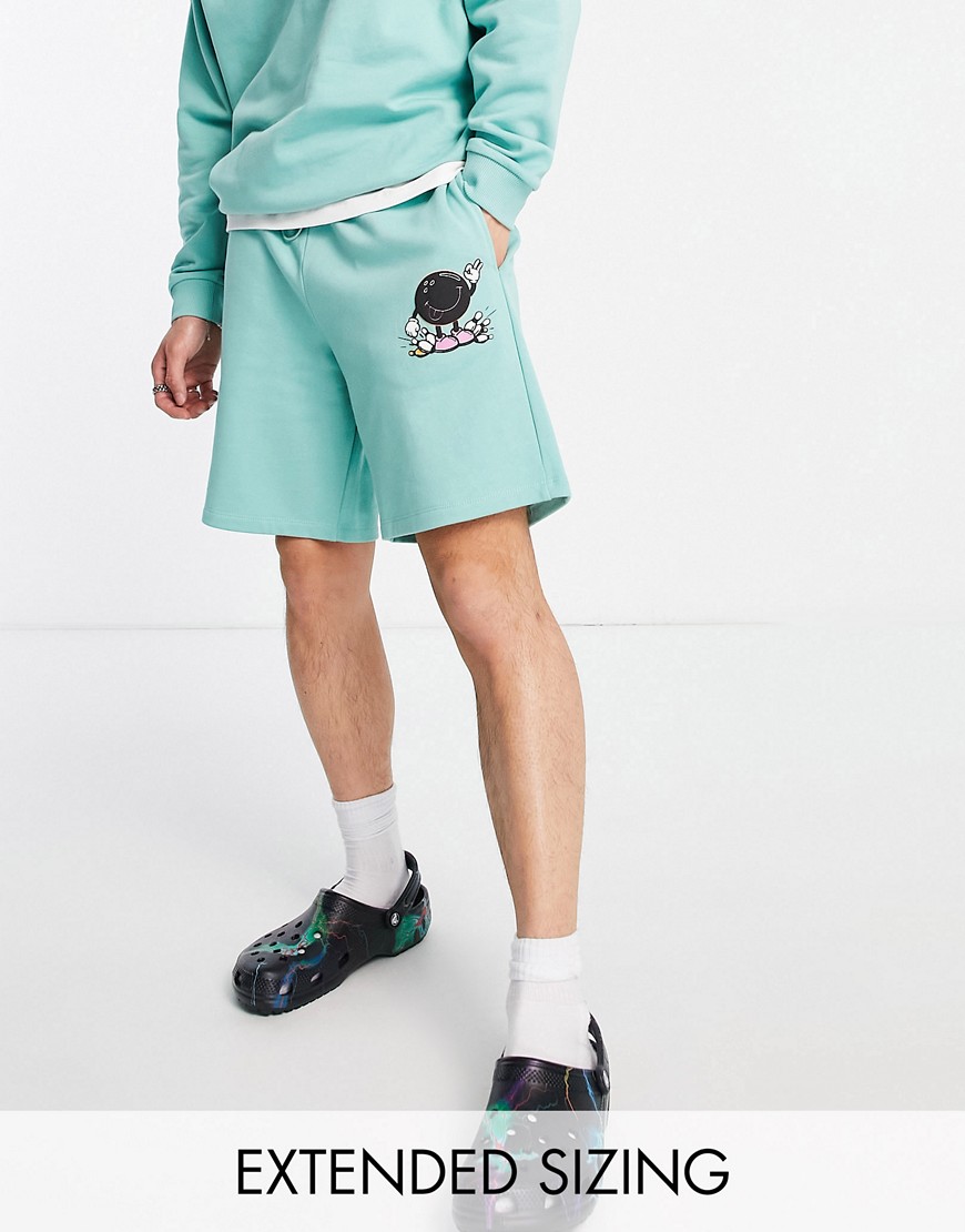 Crooked Tongues relaxed shorts with bowling graphic print in teal green