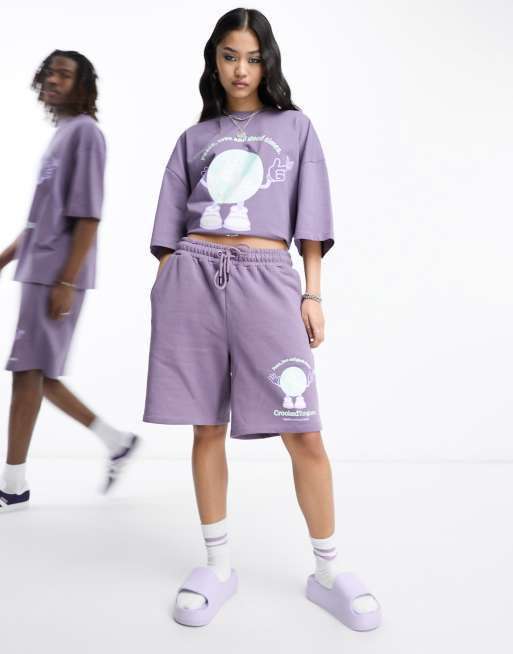 Crooked Tongues - Ruimvallende uniseks short met 'Peace and Love'-print in donkerpaars, deel van co-ord set