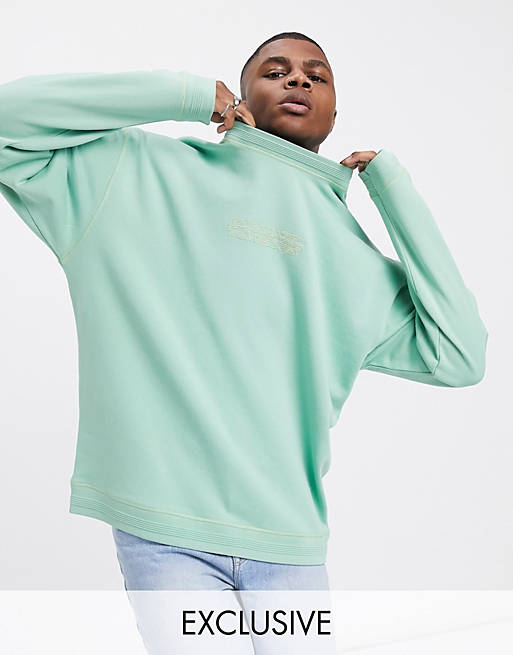 Crooked Tongues sweatshirt in green with tonal logo