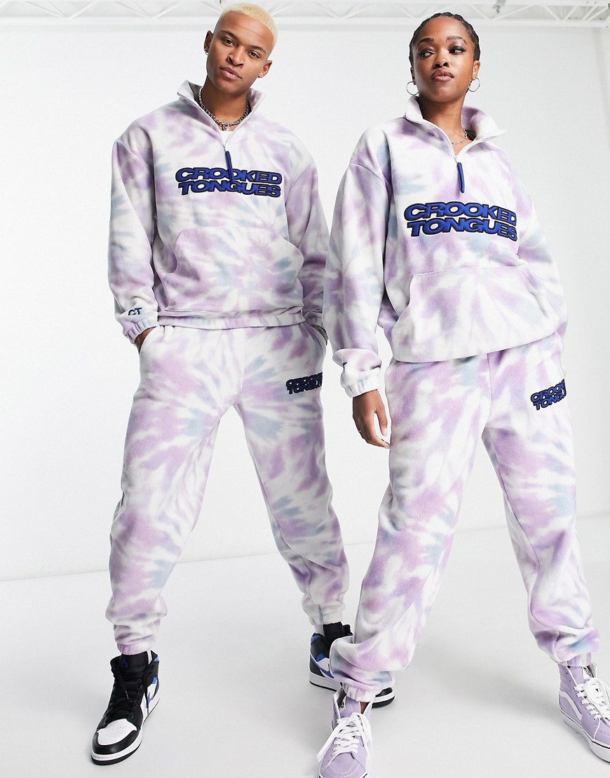 Crooked Tongues unisex co-ord relaxed joggers in all over print tie dye polar fleece with embroidere