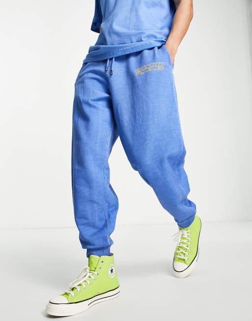 Crooked Tongues washed trackies with logo print in blue (part of a set)