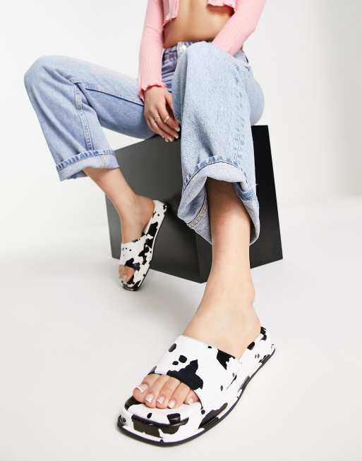 Cow store print birkenstocks