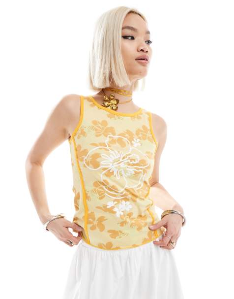 fitted tank top in retro yellow with hibiscus flower