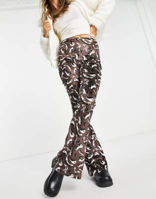 Daisy Street high waisted velvet flares in wavy yin yang print | ASOS