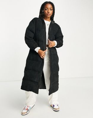 maxi puffer coat in black jumbo corduroy with hood