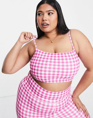 Daisy Street Plus Active gingham strappy light support sports bra in pink - ASOS Price Checker